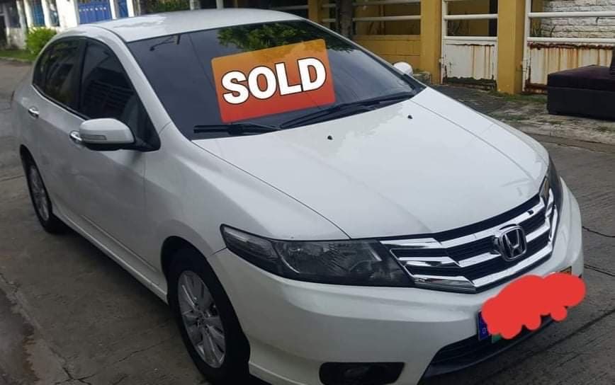 White Honda City photo