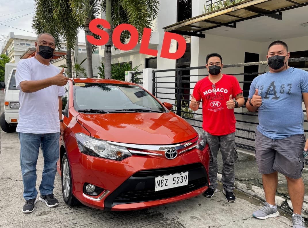 Red Toyota Vios photo