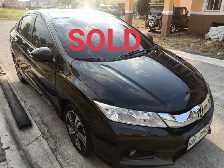 Black Honda City photo