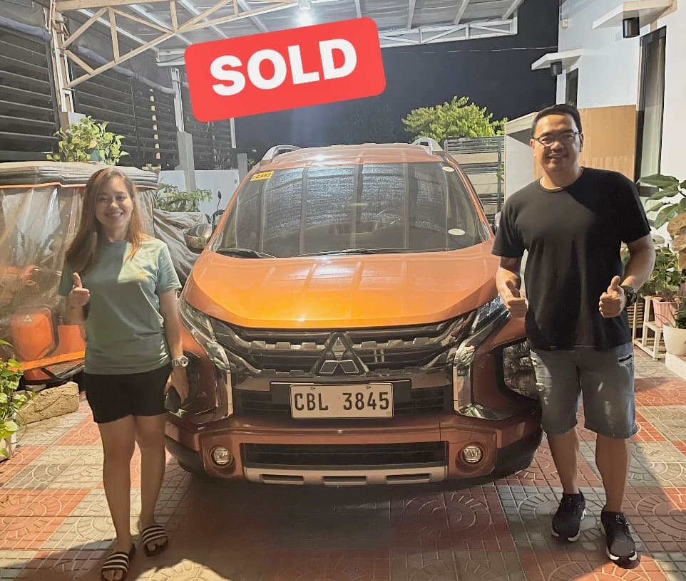 Orange Mitsubishi Xpander photo
