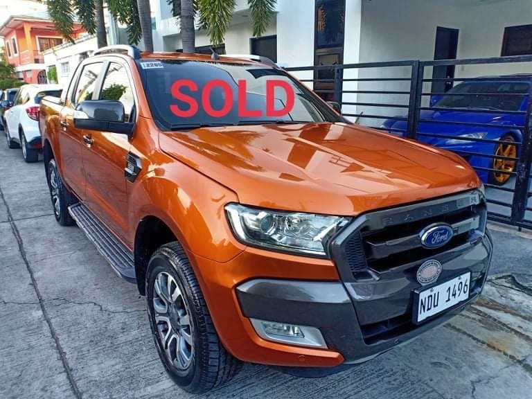 Orange Ford Ranger photo