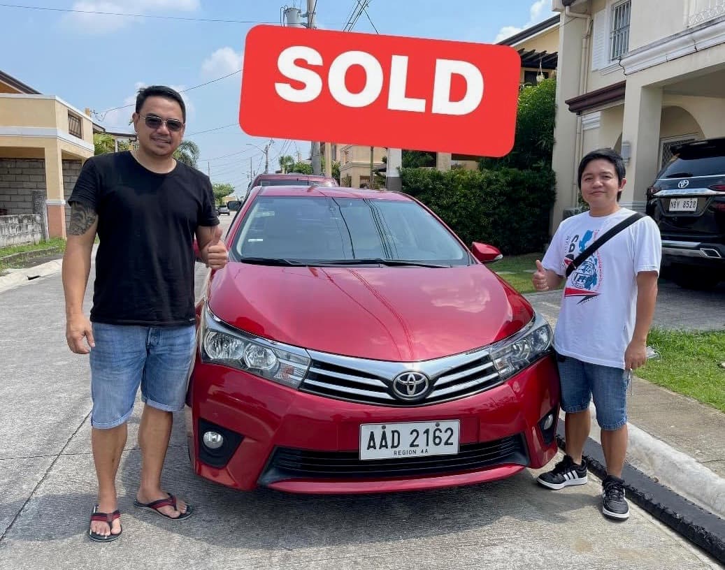 Red Toyota Altis photo